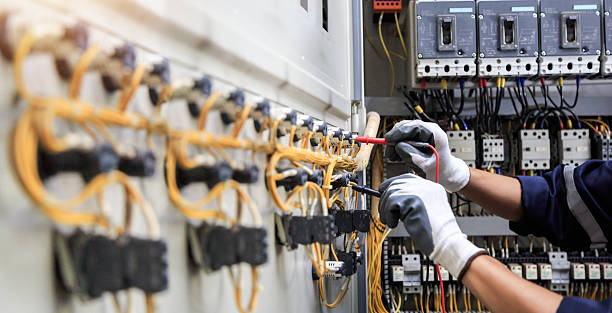 Professional Electrician technician working in Pella, IA
